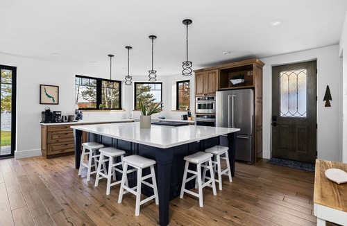 Bellaire House | [Modern Lake House] hot tub, dock, sandy shoreline, kayaks, foosball, Bellaire.