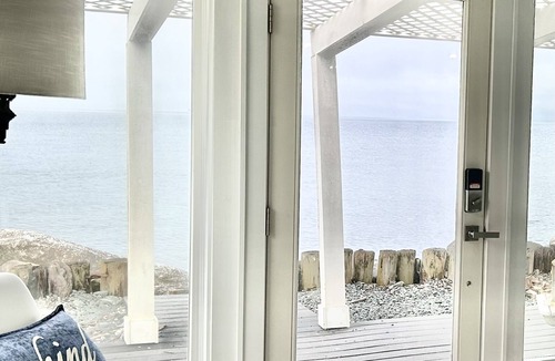 Oak Harbor Cabin | Modern Mid-Century Cabin, on the beach, with views of the San Juan Islands!