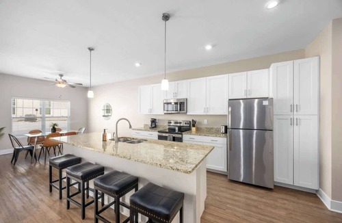 Grandville Condo | Modern New Build 2BR 2BA Condo w Garage and Patio