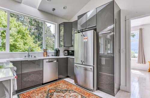 Stevenson House | Mountain and river-view home & studio with fireplace, grills, outdoor areas