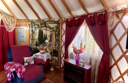 Veneta Cabin | Mystical Rose is a whimsical flower themed & fully furnished Yurt.