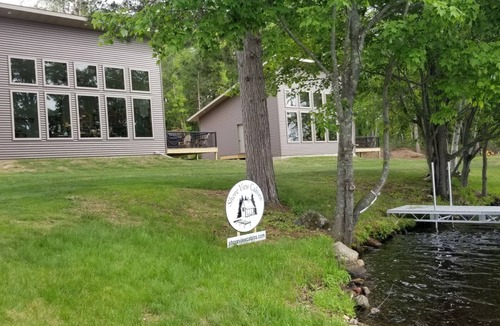 Phillips Cabin | New waterfront cabin with expansive lake-facing windows, Long Lake, Phillips