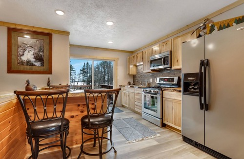 Stone Lake Cabin | Northwoods multiple family size lake cabin. Snowmobile trail access