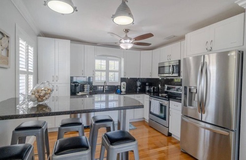 Little Venice House | Oasis Canal-Front Home: Pool, Dock, BBQ, Wide Canal Boat Access, and more!