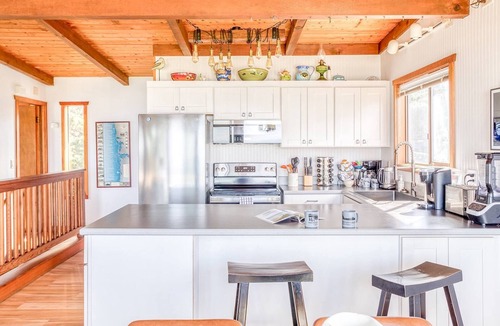 Cape Meares House | Oceanfront cottage with hot tub beach access fireplace and WiFi Dog friendly