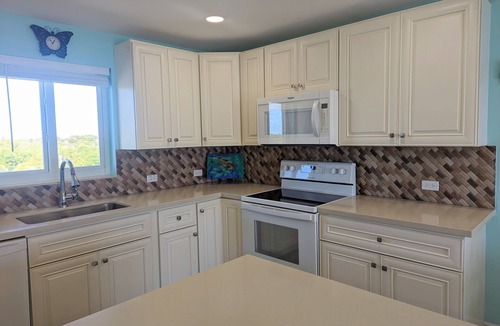 Tavernier Condo | Oceanfront Luxury Condo. Step on to the beach.