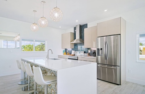 Little Venice House | Oceanfront PARADISE w Heated pool, 55’ dock, ocean view & bathroom in every room