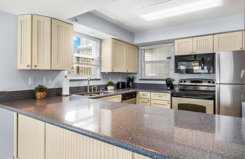 Satellite Beach Condo | Panoramic Beachfront Views – Ground-Floor Corner Condo, Pool Access & Steps to Beach 🏝️