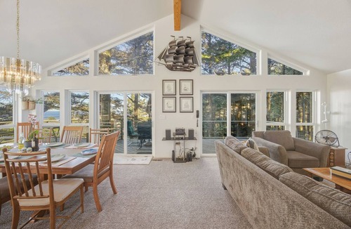 Cape Meares House | Peaceful 4BR Cape Meares Home | Ocean Views, Forest Setting, Wraparound Deck + King Bed