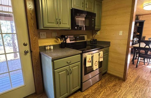 Westphalia Cabin | Pine Oaks Cabin includes Guest Pole Barn. Modern comfort meets county living.