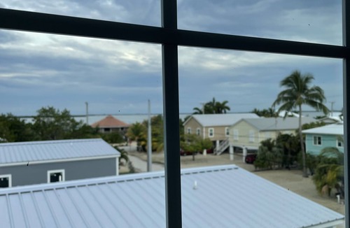 Breezeswept Beach Estates House | Pool coming soon! Beautiful House on Ramrod Key with boat slip & water access.