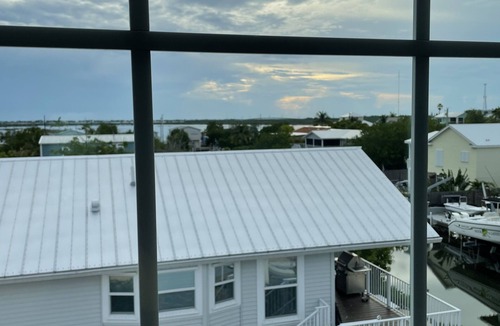 Breezeswept Beach Estates House | Pool coming soon! Beautiful House on Ramrod Key with boat slip & water access.