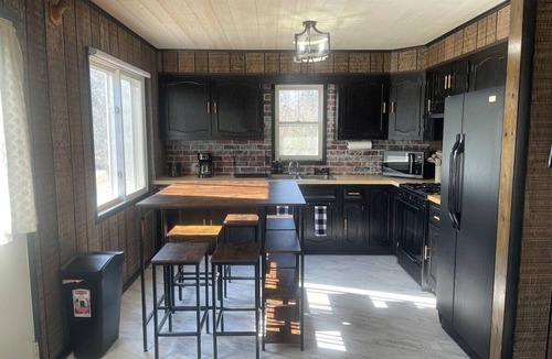 Cheboygan Cabin | Private 1 Acre Creekside Retreat , Game Room , Fire Pit , Kayaks