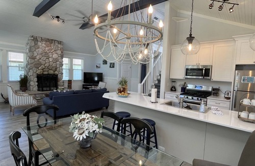 Union Pier House | Private heated pool hot tub large deck blocks to Berrien beach