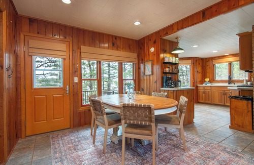 Luck Cabin | Private Lakefront Cabin with Pontoon & Hot Tub