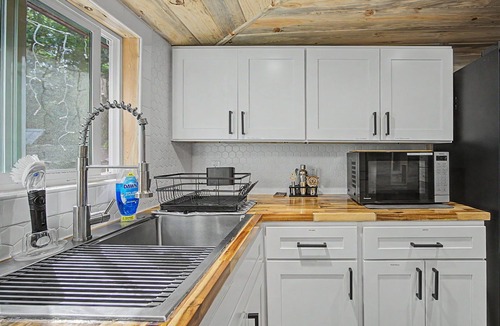 Mount Hood Village Cabin | Private Mt Hood Riverfront w/Sandy Beach, Hot Tub, 2 Kings, Dog Friendly