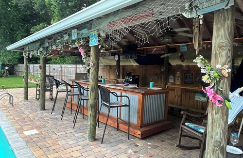 North Northwest Pensacola House | Private Oasis with Pool & Tiki Bar