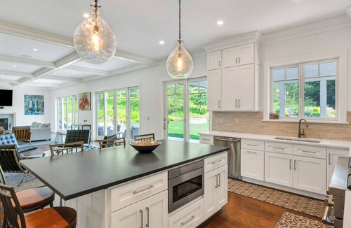 North Sea House | Private Southampton Oasis with Pool, Spa & Effortless Indoor-Outdoor Living