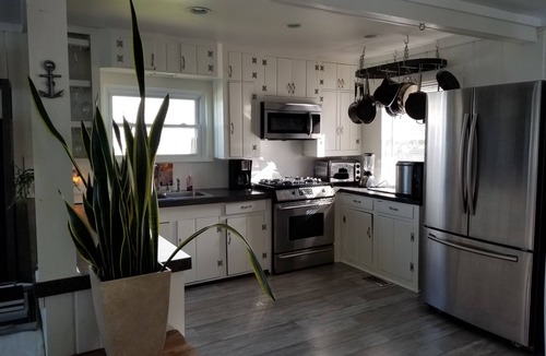 Kawkawlin Cottage | Quaint beach cottage with magnificent sunrises on Saginaw Bay/Lake Huron
