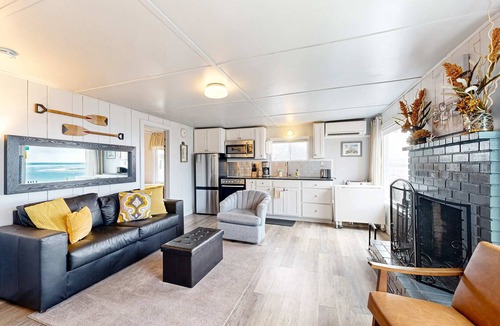 Netarts House | Quaint oceanfront hideaway with open layout fireplace central AC and gas grill