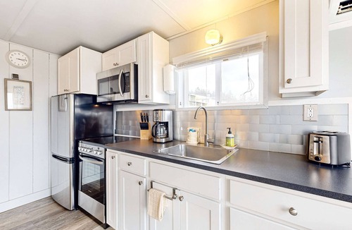 Netarts House | Quaint oceanfront hideaway with open layout fireplace central AC and gas grill