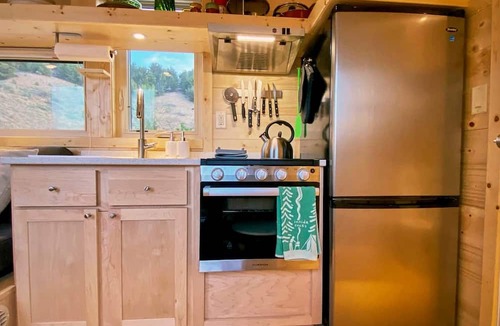 Arroyo Hondo Cabin | Rainbow Tiny Home with View & Hot Tub near Hot Springs, El Prado, NM