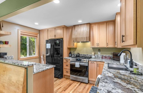 Mount Hood Village Cabin | Recently remodeled riverfront home with fireplace, firepit & W&D - dog-friendly