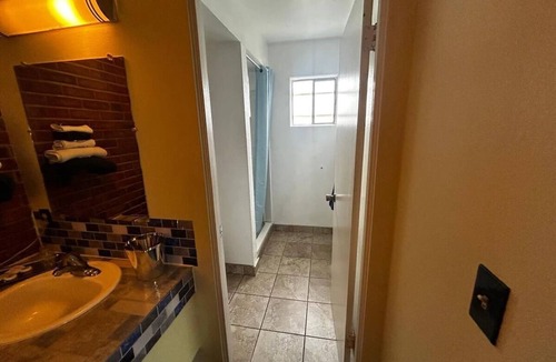 Longview Hotel | Relax in a Pet-Friendly Queen Bed Room Close to Riverside Park Trails