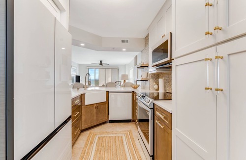 Seawinds Condo Condo | Renovated direct oceanfront corner 2/2 with a large balcony, heated pool, and garage