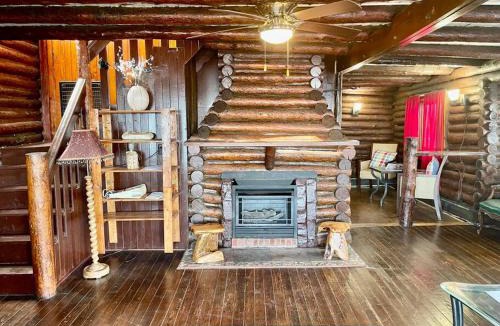 Luna Pier House | Restored historic log cabin & deck on Lake Erie
