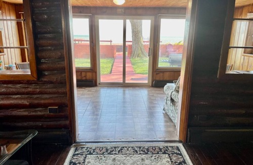 Luna Pier Cabin | Restored historic log cabin and deck on Lake Erie