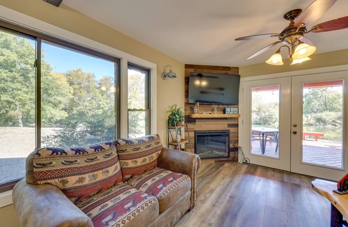 Mount Ida Cabin | Riverfront Arkansas Abode - Furnished Deck & Grill