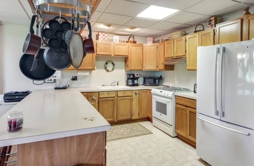 South Boardman House | Riverfront Beach Lodge Home in the Heart of Snowmobile Trails