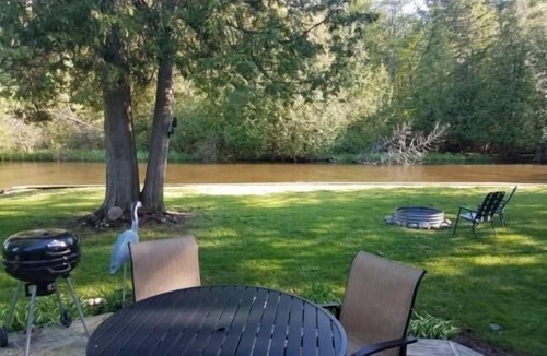 Indian River Cottage | Riverfront Cottage w/Boat Docking and easy access to Burt Lake