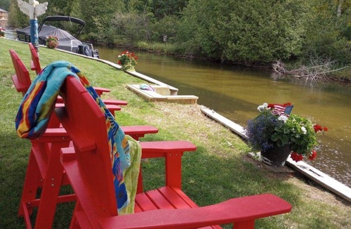 Indian River Cottage | Riverfront Cottage w/Boat Docking and easy access to Burt Lake