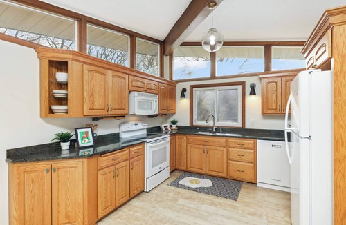 St. Cloud House | Riverfront Home 1 HR to MSP. Sleeps 9. Main Floor Living. Firepit & Pool Table