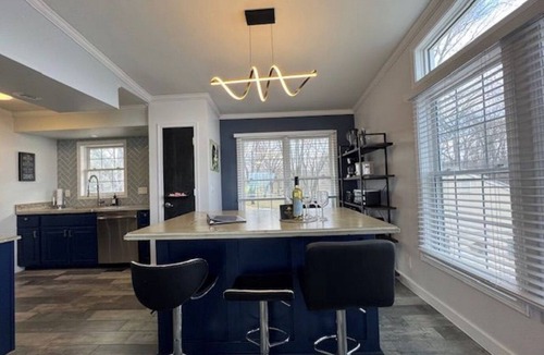 Lynn Center House | Riverfront Home with Hot Tub, Fire Pit & Scenic Views