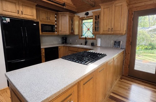 Coloma Cabin | Riverfront Log Cabin Near St Joe & South Haven
