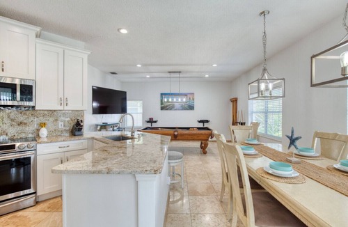 Palm Harbor House | Riverfront, Pool, Dock, Pool Table, River