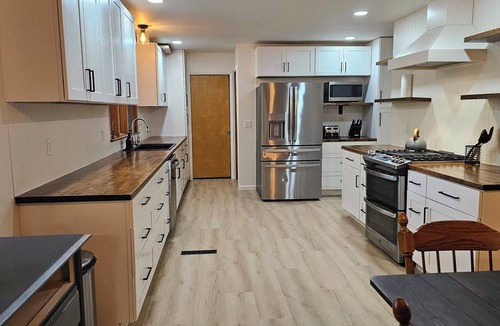 Owosso House | Riverside Retreat - Hot Tub, Fire Pit, River Views
