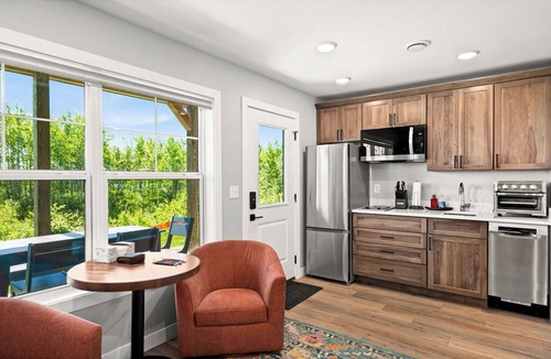 Riverside Condo | RiverWest Hunters Landing - Hot Tub - Riverfront - Dogs