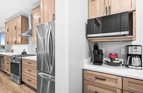 Riverside House | RiverWest Stones Throw Chalet - Sauna - River Front - Sauna - Dog Friendly