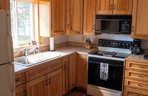 Solon Springs Cabin | Rustic Lake Front Log Cabin: Stunning Sunset Views, Private Dock & Fast WiFi