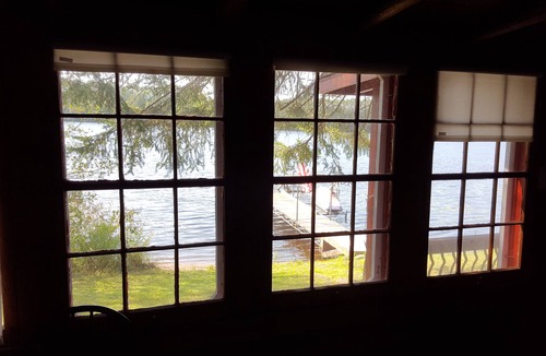 Tomahawk Cabin | Rustic Log Cabin built 1897 just steps from lake