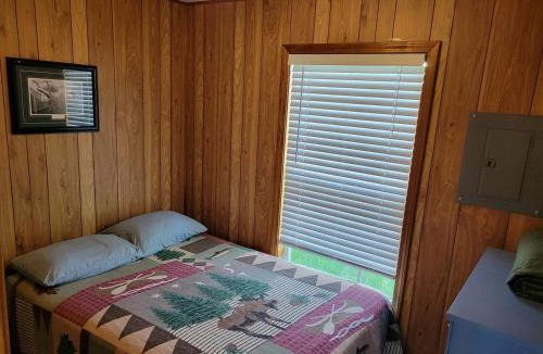 Houghton Lake House | Rustic Waterfront Cabin with Fire Pit in Houghton Lake, Michigan