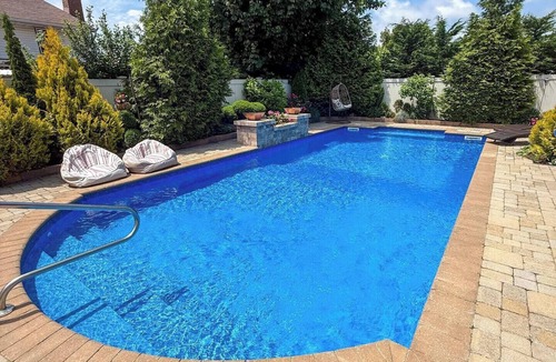 Massapequa House | Ryder Cup Accommodation < 10 miles from Bethpage Black, heated salt water pool