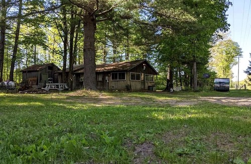 Dickson Township Cabin | Secluded Rustic Cabin Rental Inside Manistee National Forest in Brethren, Michigan