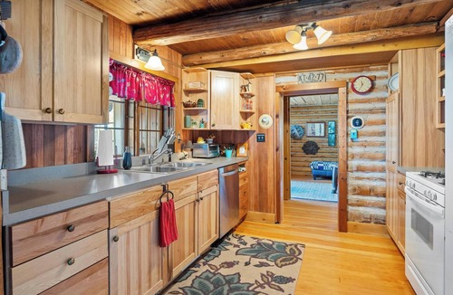 Charlevoix Cabin | Serene Lakeside Cottage with Stunning Sunsets, Just Minutes from Charlevoix!