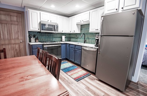 Boyne Falls Apartment | Ski-in/out | 652 Disciples Village Condo | Gas Fireplace | 5 BR | Sleeps 18!