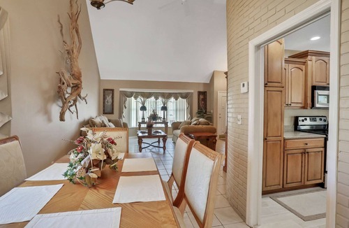 Harbor Hills House | Snowbird friendly elegant home with waterfront location pool grill fireplace